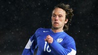 Martin Reim juga punya 157 caps bersama timnas Estonia, menempatkannya di posisi 12 caps terbanyak. Dia kini menjabat sebagai manajer timnas negaranya. (Foto: Bryn Lennon/Getty Images)