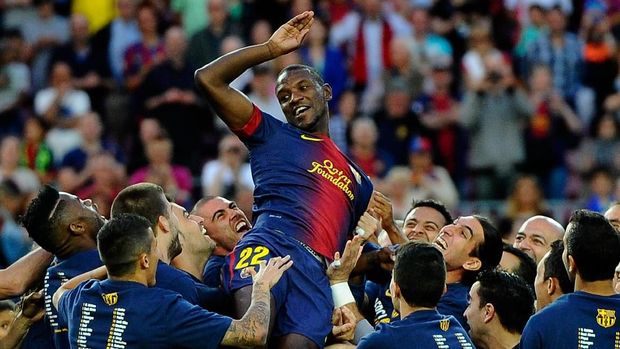 BARCELONA, SPAIN - JUNE 01:  FC Barcelona players throw their team-mate Eric Abidal into the air after he played his last match with FC Barcelona at the end of the La Liga match between FC Barcelona and Malaga CF at Camp Nou on June 1, 2013 in Barcelona, Spain.  (Photo by David Ramos/Getty Images)