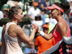 Radwanska Hentikan Halep