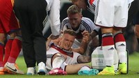 Marco Reus tampil impresif bersama Borussia Dortmund di musim 2013/2014 dan menjadi andalan timnas Jerman sepanjang kualifikasi Piala Dunia 2014. Apesnya, Reus cedera ligamen beberapa pekan sebelum Piala Dunia sehingga absen ketika timnnya jadi kampiun. (Foto: DANIEL ROLAND/AFP PHOTO)