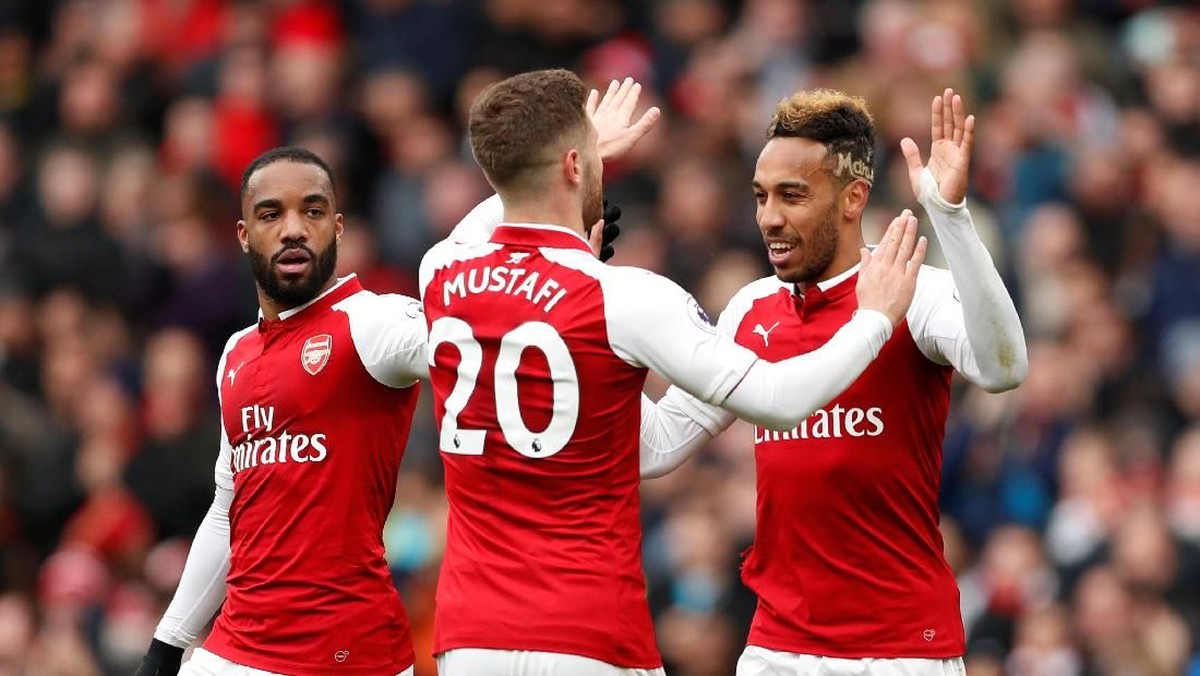 Pemain Arsenal merayakan gol ke gawang Stoke City di pekan ke-31. (Foto: John Sibley/Reuters)