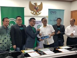 Grab Gandeng Damri, Incar Penumpang di Terminal