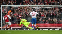 Pierre-Emerick Aubameyang yang menjadi pemecah kebuntuan Arsenal. Mereka membutuhkan waktu 75 menit untuk gol pembuka, itupun dari titik putih. (Foto: Hannah McKay/Reuters)