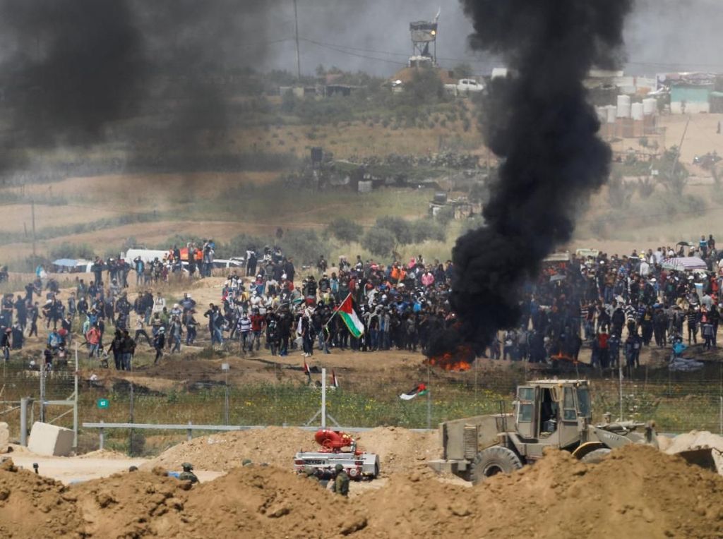 Warga Palestina dan Tentara Israel Bentrok Lagi di Perbatasan Gaza Warga Palestina dan Tentara Israel Bentrok Lagi di Perbatasan Gaza