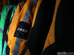 Akuisisi Uber Mengarah Monopoli, Grab Kena Sanksi