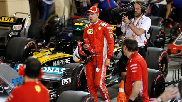 Sebastian Vettel mengalahkan Kimi Raikkonen di kualifikasi F1 GP Bahrain.
