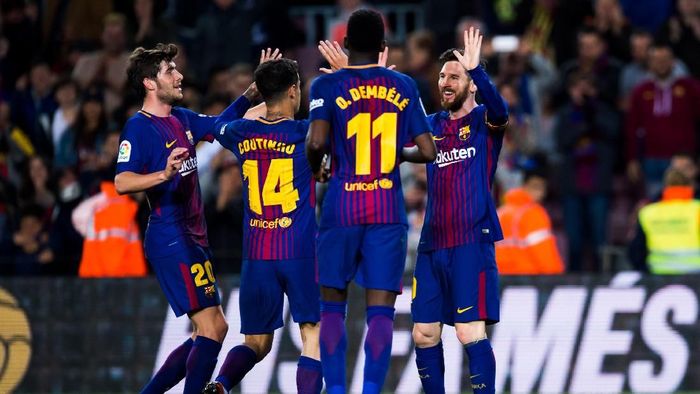 Barcelona BARCELONA, SPAIN - APRIL 07: Lionel Messi of FC Barcelona celebrates with teammates after scoring his teams second goal during the La Liga match between Barcelona and Leganes at Camp Nou on April 7, 2018 in Barcelona, Spain. (Photo by Alex Caparros/Getty Images)