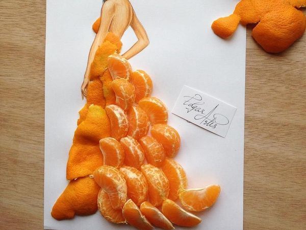 Keren! Lukisan Wanita Ini Diberi Baju dari Susunan Buah dan Kulitnya