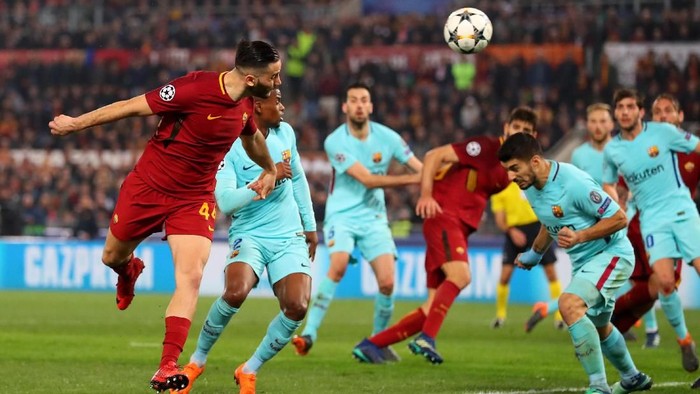 ROME, ITALY - APRIL 10:  Kostas Manolas of AS Roma scores his sides third goal during the UEFA Champions League Quarter Final Second Leg match between AS Roma and FC Barcelona at Stadio Olimpico on April 10, 2018 in Rome, Italy.  (Photo by Catherine Ivill/Getty Images)