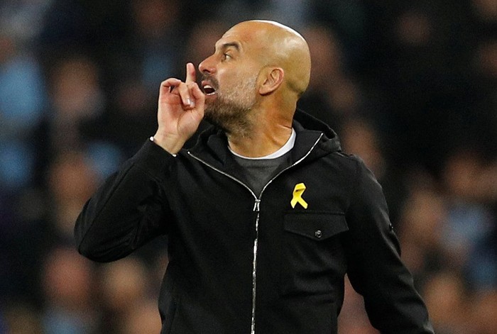 Soccer Football - Champions League Quarter Final Second Leg - Manchester City vs Liverpool - Etihad Stadium, Manchester, Britain - April 10, 2018   Manchester City manager Pep Guardiola gestures to referee Antonio Miguel Mateu Lahoz at half time   REUTERS/Darren Staples