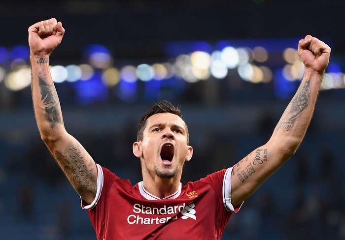 MANCHESTER, ENGLAND - APRIL 10:  Dejan Lovren of Liverpool celebrates his sides victory after the UEFA Champions League Quarter Final Second Leg match between Manchester City and Liverpool at Etihad Stadium on April 10, 2018 in Manchester, England.  (Photo by Laurence Griffiths/Getty Images,)