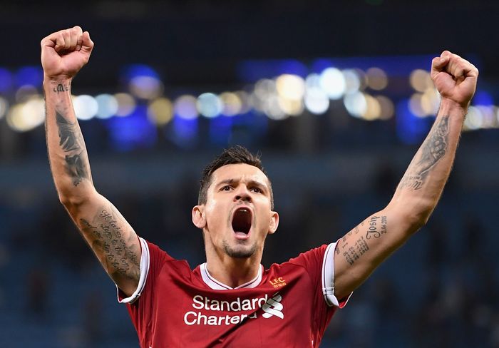 Dejan Lovren MANCHESTER, ENGLAND - APRIL 10: Dejan Lovren of Liverpool celebrates his sides victory after the UEFA Champions League Quarter Final Second Leg match between Manchester City and Liverpool at Etihad Stadium on April 10, 2018 in Manchester, England. (Photo by Laurence Griffiths/Getty Images,)