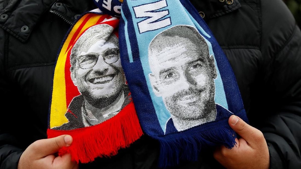 Juergen Klopp kini menggunguli Pep Guardiola dalam rekor pertemuan (Jason Cairnduff/Reuters)