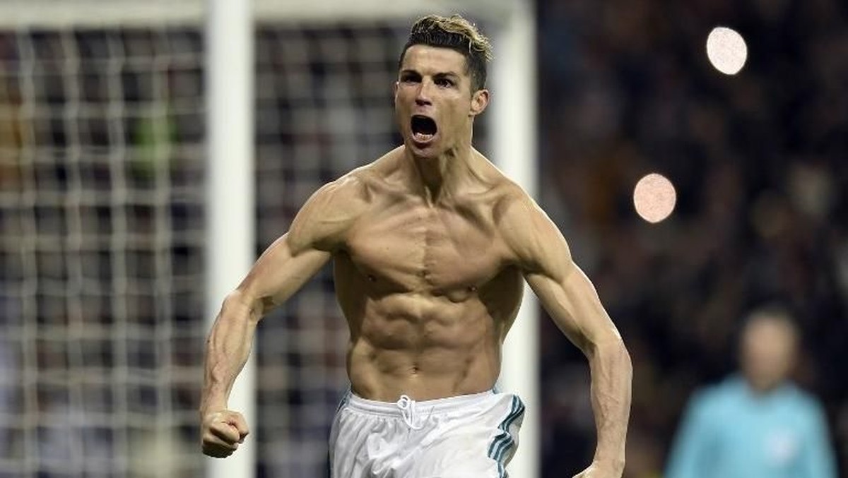 Cristiano Ronaldo usai mencetak gol di Liga Champions (Foto: OSCAR DEL POZO/AFP)