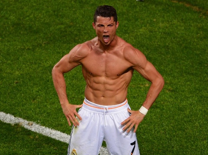 LISBON, PORTUGAL - MAY 24:  Cristiano Ronaldo of Real Madrid celebrates scoring their fourth goal from the penalty spot during the UEFA Champions League Final between Real Madrid and Atletico de Madrid at Estadio da Luz on May 24, 2014 in Lisbon, Portugal.  (Photo by Lars Baron/Getty Images)
