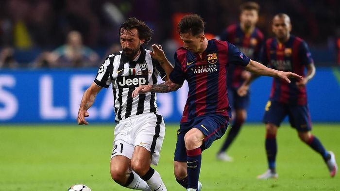Andrea Pirlo - Lionel Messi BERLIN, GERMANY - JUNE 06: Lionel Messi of Barcelona tackles Andrea Pirlo of Juventus during the UEFA Champions League Final between Juventus and FC Barcelona at Olympiastadion on June 6, 2015 in Berlin, Germany. (Photo by Laurence Griffiths/Getty Images)