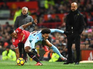 Guardiola: MU Masih Bisa Rebut Gelar Juara dari City