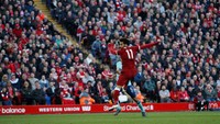 Keunggulan Liverpool baru bertambah di babak kedua. Salah yang membobol gawang Bournemouth lewat sundulan memanfaatkan crossing terukur Trent-Alexander Arnold. (Foto: Andrew Yates/Reuters)