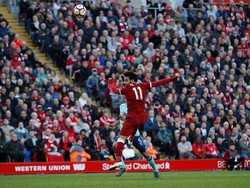 Keunggulan Liverpool baru bertambah di babak kedua. Salah yang membobol gawang Bournemouth lewat sundulan memanfaatkan crossing terukur Trent-Alexander Arnold. (Foto: Andrew Yates/Reuters)