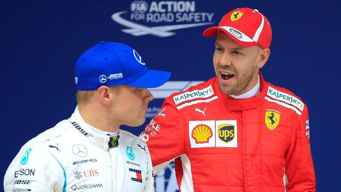 Sebastian Vettel akan start terdepan di GP Shanghai sesudah merebut pole dengan selisih waktu mencapai 0,5 detik dari Valtteri Bottas (Foto: Aly Song/Reuters)