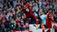 Firmino lantas melakukan perayaan gol dengan melompat. Pemain asal Brasil itu sudah mencetak 15 gol di Liga Inggris musim ini. (Foto: Andrew Yates/Reuters)