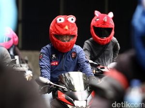 Menggemaskan, Pemotor Berhelm Elmo Bikin Heboh di Jalanan