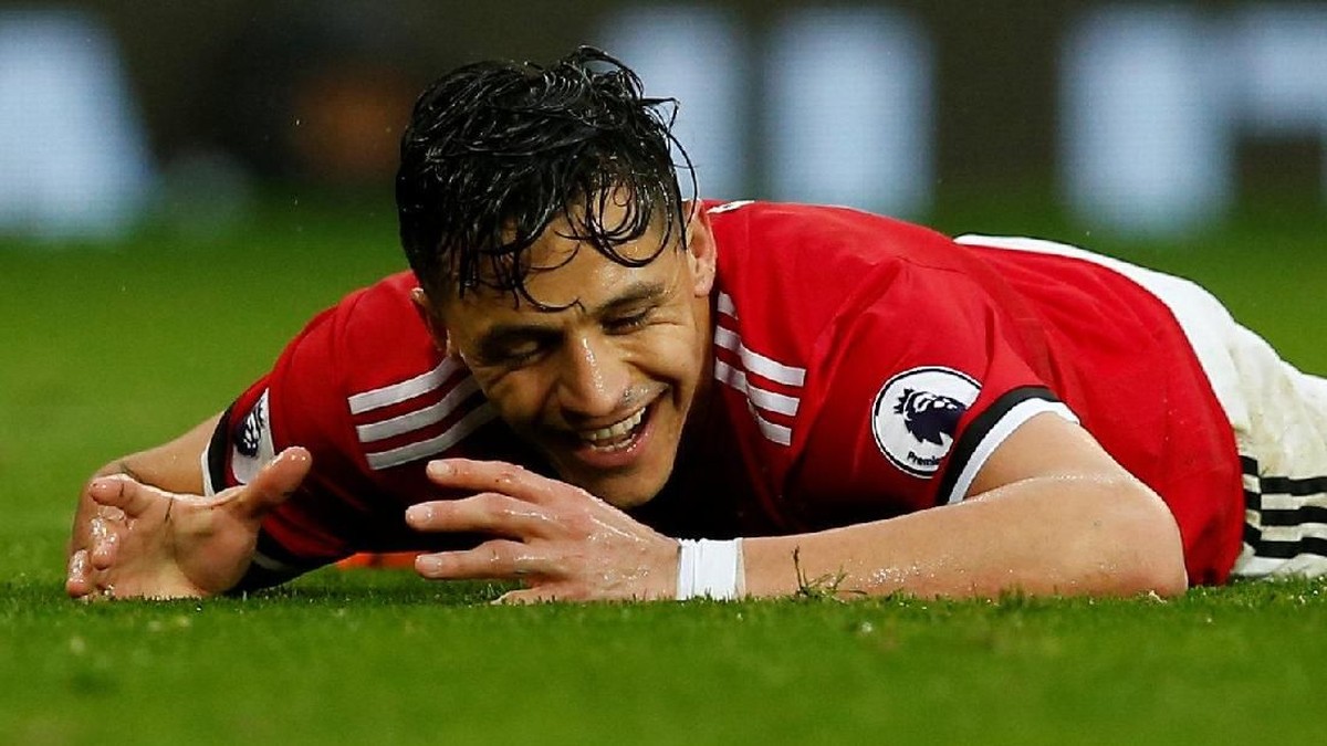 Alexis Sanchez dalam balutan seragam MU (Foto: Jason Cairnduff/Reuters)