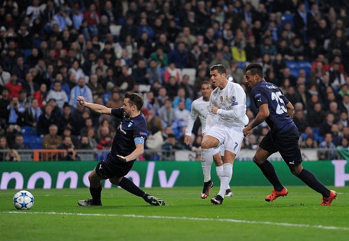 MADRID, SPAIN - DECEMBER 08:  Cristiano Ronaldo of Real Madrid scores Real's 5th goal during the UEFA Champions League Group A match between Real Madrid CF and Malmo FF at the Santiago Bernabeu stadium on December 8, 2015 in Madrid, Spain.  (Photo by Denis Doyle/Getty Images)