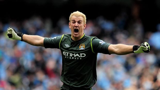 MANCHESTER, ENGLAND - MAY 13:  Goalkeeper Joe Hart of Manchester City celebrates winning the title as the final whistle blows during the Barclays Premier League match between Manchester City and Queens Park Rangers at the Etihad Stadium on May 13, 2012 in Manchester, England.  (Photo by Shaun Botterill/Getty Images)