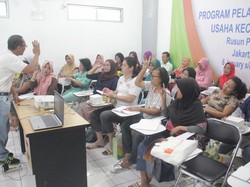 Ibu Rumah Tangga di Rusunawa Pulogebang Belajar Fotografi