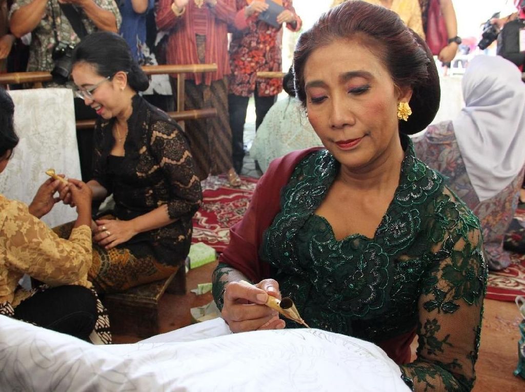 Perempuan dan Pariwisata di Mata Menteri Susi Perempuan dan Pariwisata di Mata Menteri Susi