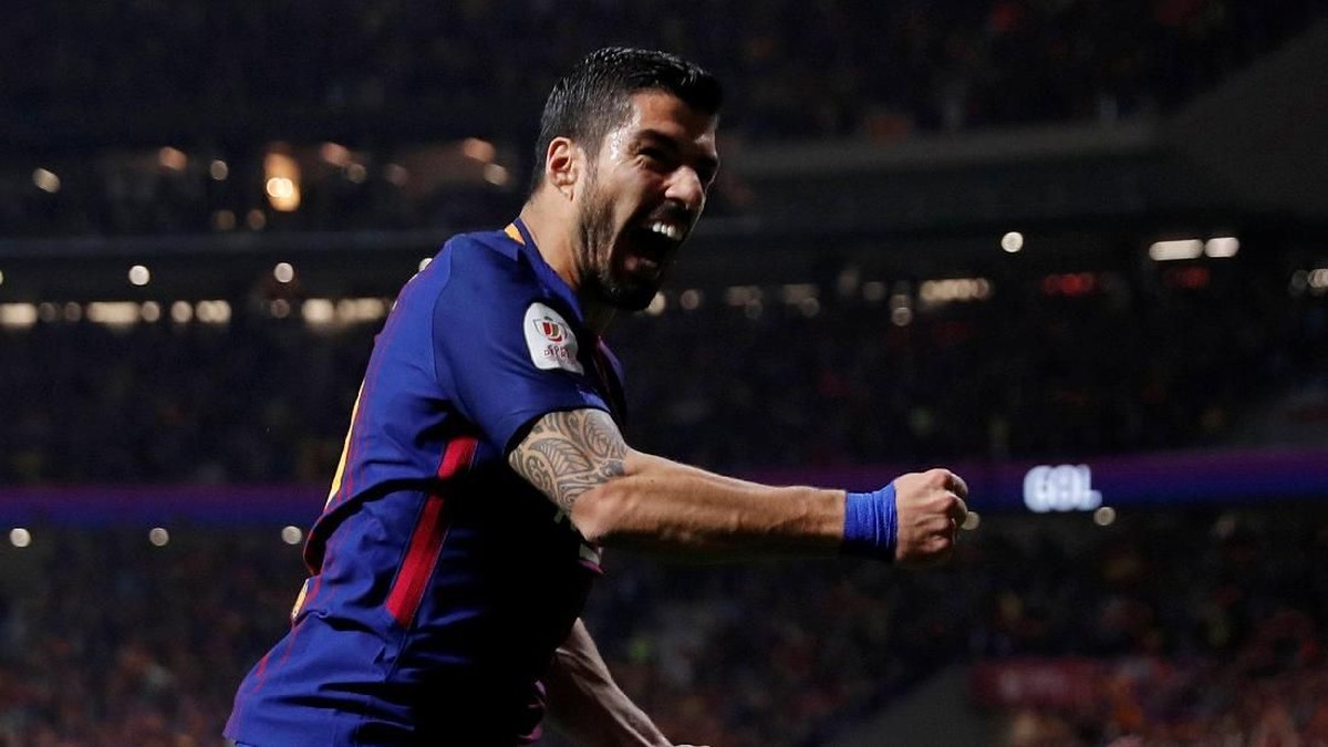Penyerang Barcelona Luis Suarez merayakan gol ke gawang Sevilla di final Copa del Rey. (Foto: Susana Vera/Reuters)