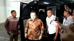 Foto: Senyum Setya Novanto Jelang Sidang Vonis