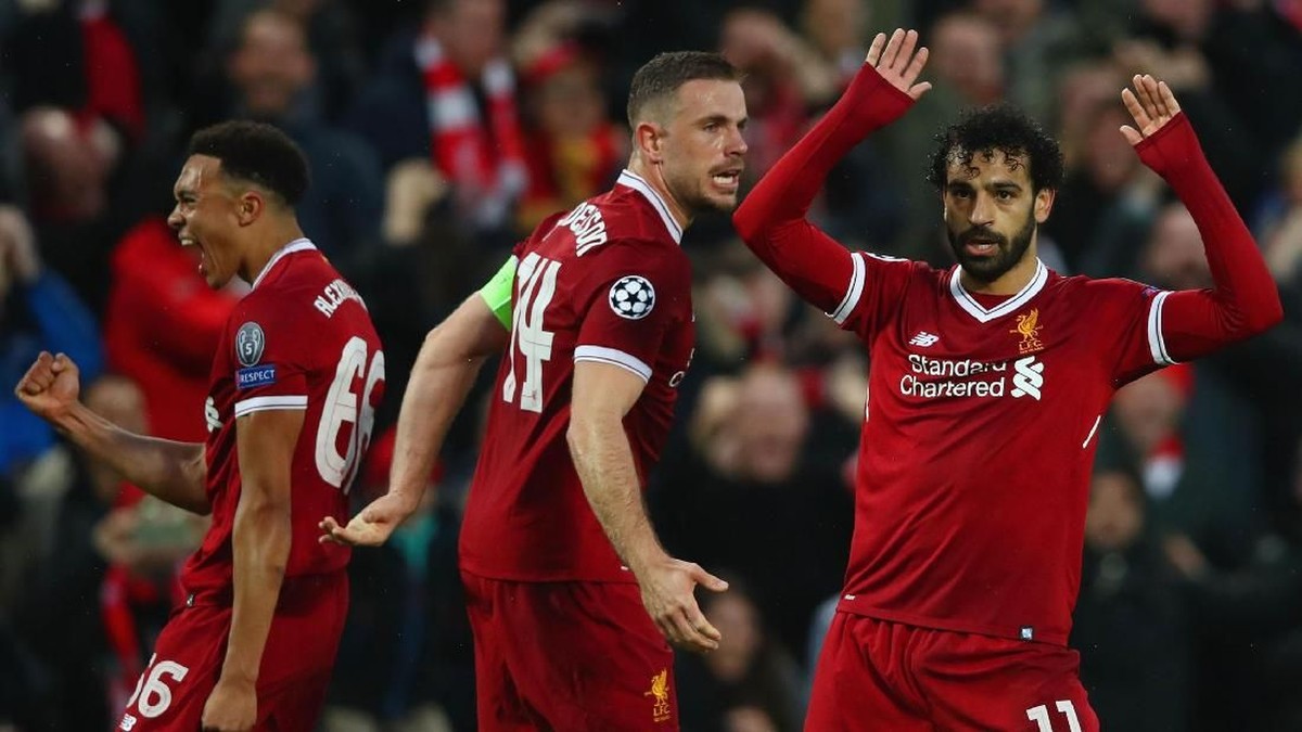 Jordan Henderson (tengah) menjadi kapten Liverpool. (Foto: Clive Brunskill/Getty Images)
