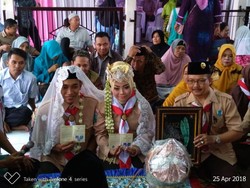 Pengantin Berseragam Pramuka Jadi Bahasan di Medsos, Ini Ceritanya