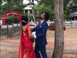 Motret Sambil Gelantungan, Inikah Fotografer Pernikahan Paling Berdedikasi?