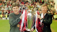 Brian Kidd (kiri) adalah anak asli Manchester dan lulusan akademi MU. Dia pun memulai karier profesional di Setan Merah. Dia lantas sempat memperkuat Arsenal dan berlanjut ke City. Kini Kidd menjadi asisten manajer di City setelah sempat menjabat posisi serupa di MU pada 1991-1998. (Foto: Ben Radford/Allsport/Getty Images)
