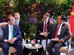 Di Singapura, Jokowi dan PM Vietnam Bahas Ekspor dan Batas Maritim