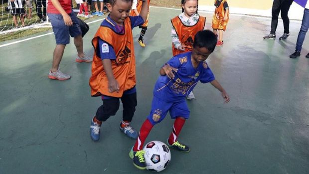Lomba futsal di Kampung Piala Dunia Kompleks Mutiara Sentul.