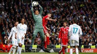 Real Madrid bermain imbang 2-2 dengan Bayern Munich di leg kedua babak 16 besar Liga Champions. Hasil tersebut meloloskan El Real ke final dengan keunggulan agregat 4-3. (Paul Hanna/Reuters)