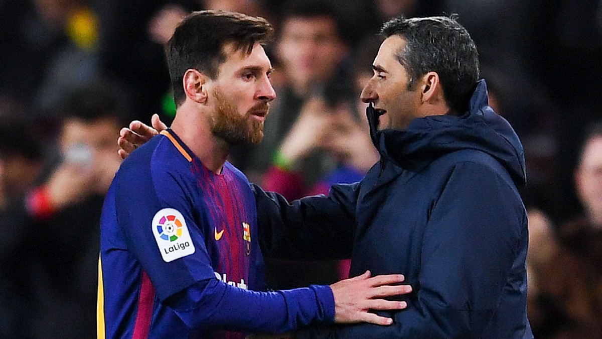 Pelatih Barcelon Ernesto Valverde dan Lionel Messi. (Foto: David Ramos/Getty Images)