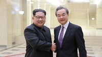 Foto: Momen Langka Pertemuan Kim Jong Un dan Menlu China