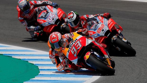 Marc Marquez berhasil berada di posisi teratas klasemen sementara MotoGP 201 usai menang di MotoGP Spanyol. (