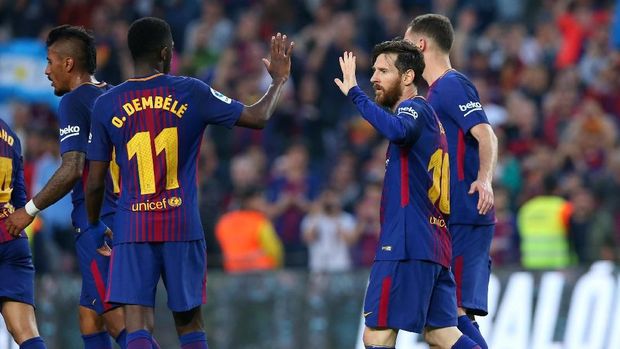 Lionel Messi mencetak gol ketiga Barcelona ke gawang Villarreal. (