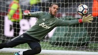 Kiper Manchester United, David De Gea, layak menjadi kiper terbaik Premier League musim ini. Dia meraih Golden Glove setelah mencatat clean sheet 18 kali. (Foto: Steve Bardens/Getty Images)