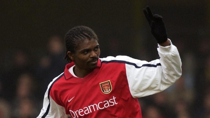 5 Jan 2002:  Nwankwo Kanu of Arsenal celebrates scoring the third goal during the AXA sponsored FA Cup third round match against Watford played at Vicarage Road, in Watford, England. Arsenal won the match 4-2. DIGITAL IMAGE. Mandatory Credit: Stu Forster/Getty Images