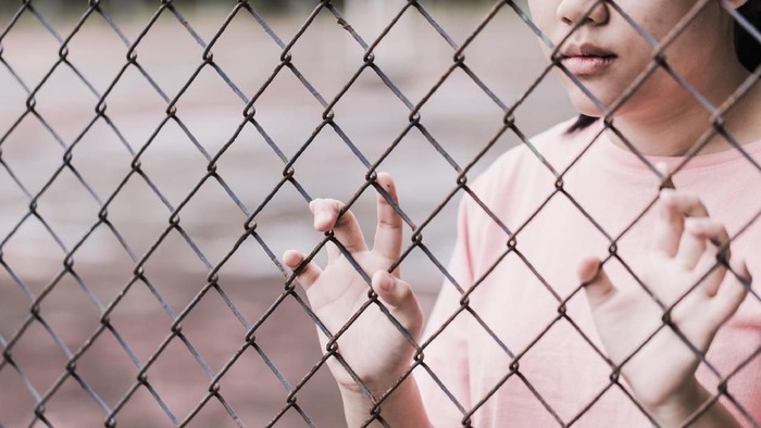 Asian little girl sad feel and touchy.