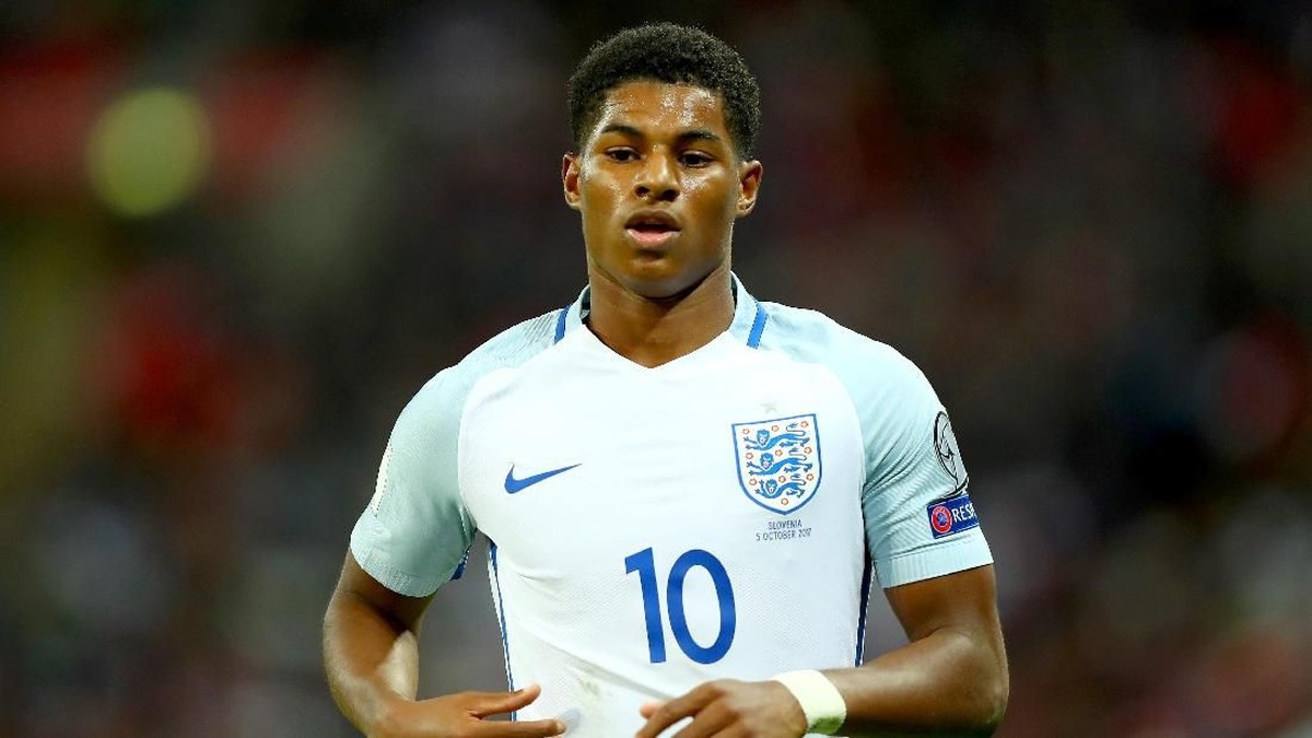 Marcus Rashford mendedikasikan keberhasilan masuk skuat timnas Inggris di Piala Dunia untuk sang ibu (Foto: Clive Rose/Getty Images)