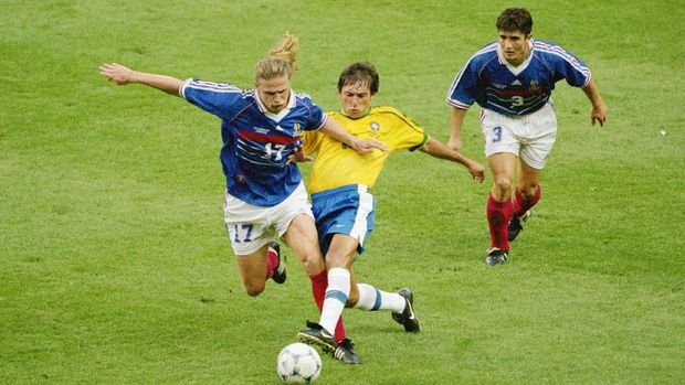 Leonardo of Brazil challenges Emmanuel Petit of France as Bixente Lizarazu looks on during the1998 FIFA World Cup Final match on 12 July 1998 played at the Stade de France, Paris, France. The match resulted in a 3-0 victory for France.(Photo by Stu Forster/Getty Images)