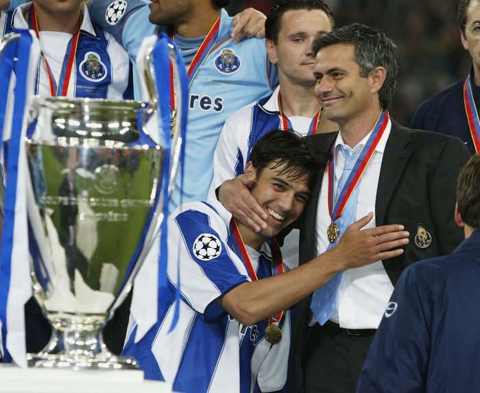 GELSENKIRCHEN, GERMANY - MAY 26:  Nuno Valente of FC Porto hugs his manager Jose Dos Santos Mourinho after winning the Champions League during the UEFA Champions League Final match between AS Monaco and FC Porto at the AufSchake Arena on May 26, 2004 in Gelsenkirchen, Germany.  (Photo by Alex Livesey/Getty Images)